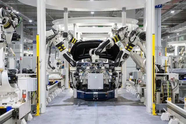 Robots assembling cars on an automotive production line